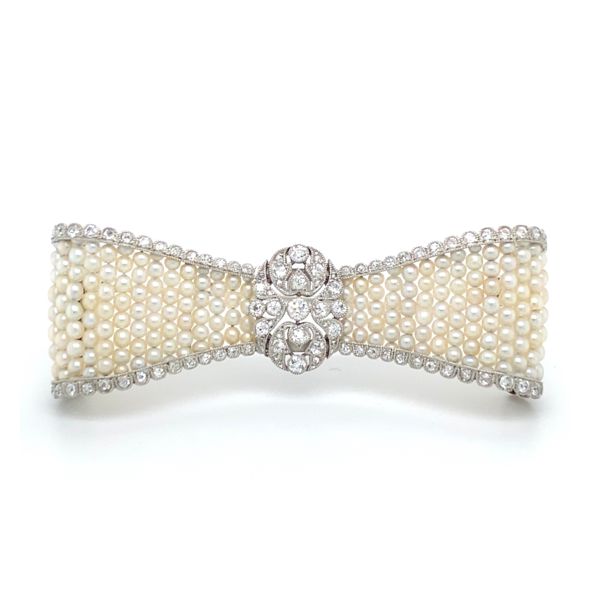 A Belle époque pearl and diamond brooch by Cartier