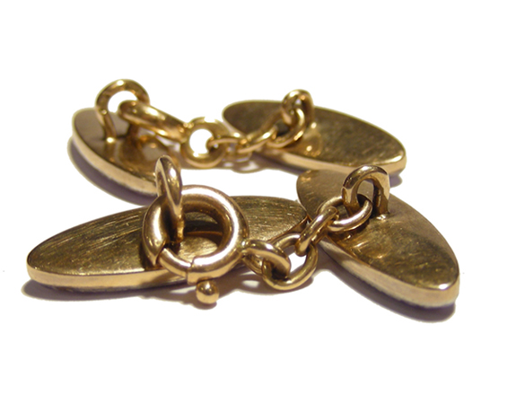 A pair of enamelled and diamond set gold cufflinks by Carl Fabergé