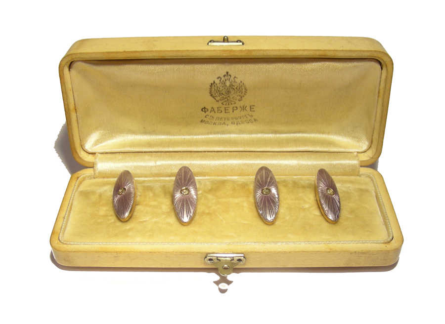 A pair of enamelled and diamond set gold cufflinks by Carl Fabergé