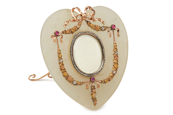 Carved bowenite, gold and gem-set frame by Carl Fabergé