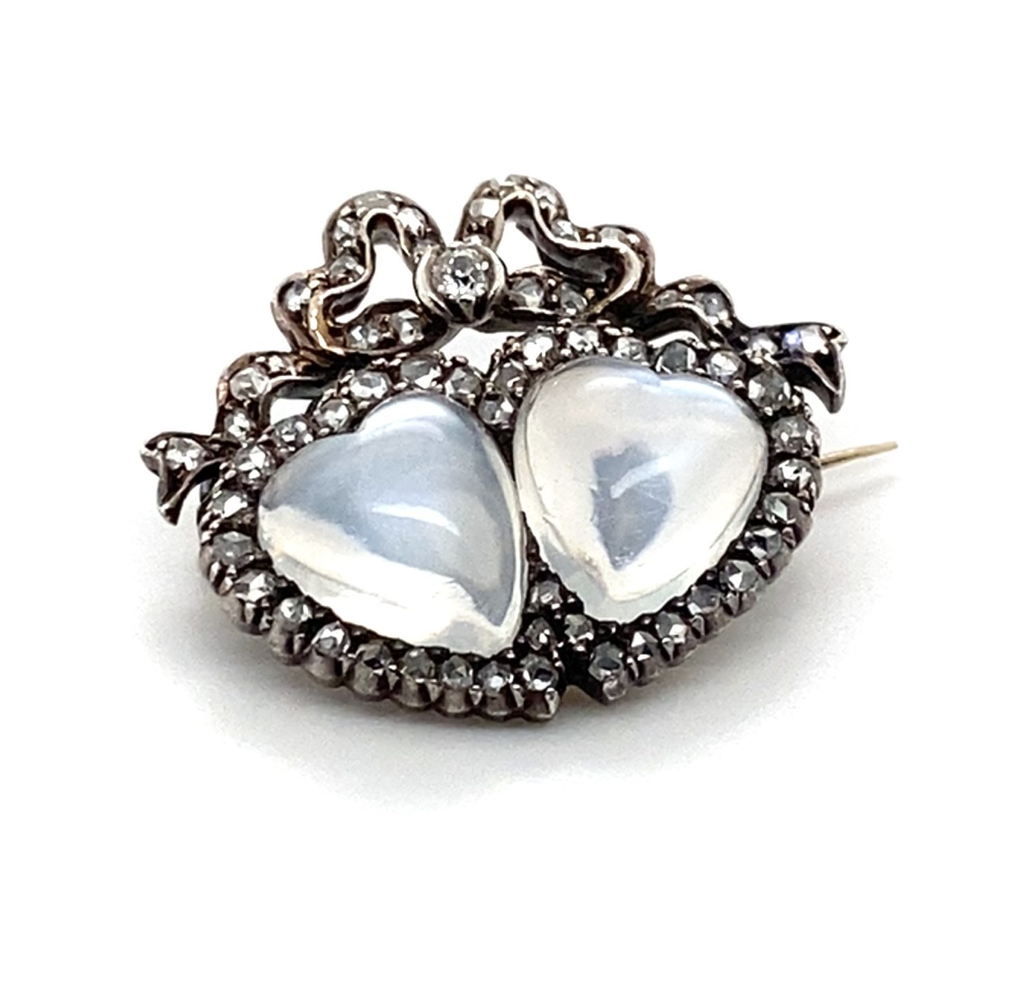 An antique moonstone and diamond brooch