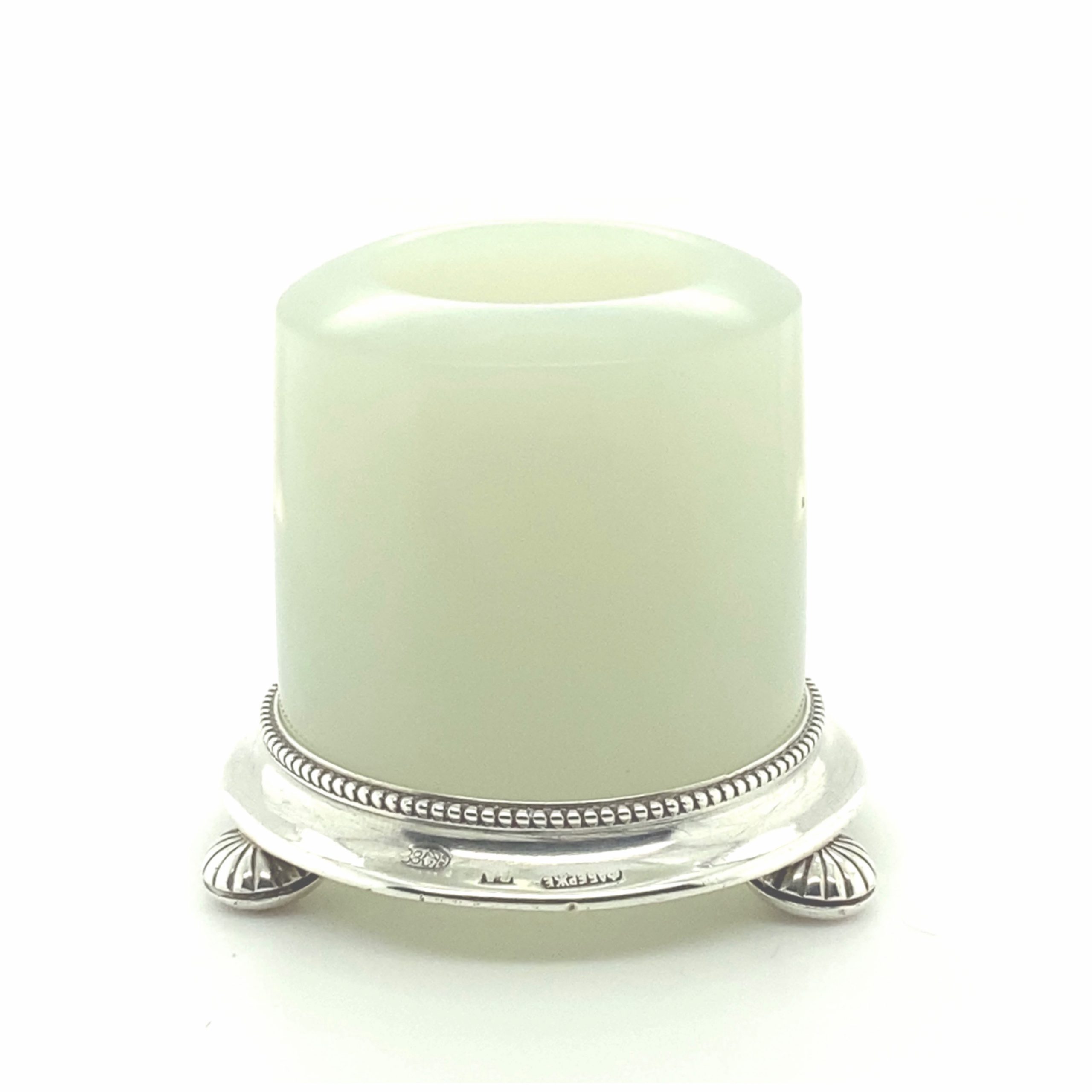 A Chinese jade archer’s ring mounted by Carl Fabergé