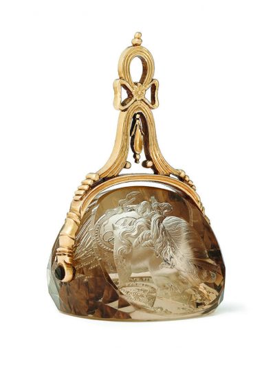 A gold mounted carved citrine seal by William or Charles Brown