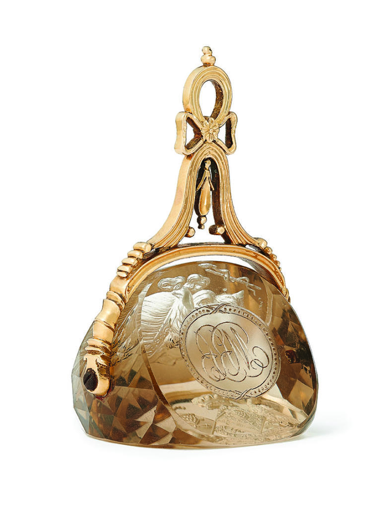 A gold mounted carved citrine seal by William or Charles Brown