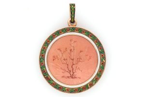 An enamelled gold locket by Carl Fabergé