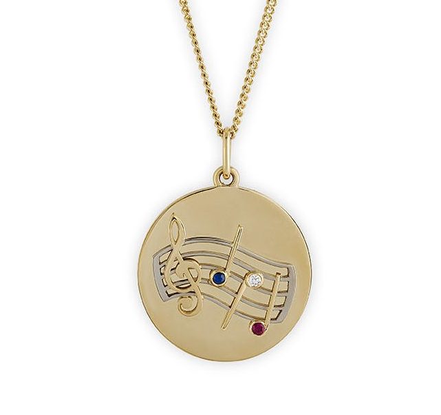 A gold and gem-set love token by Wartski
