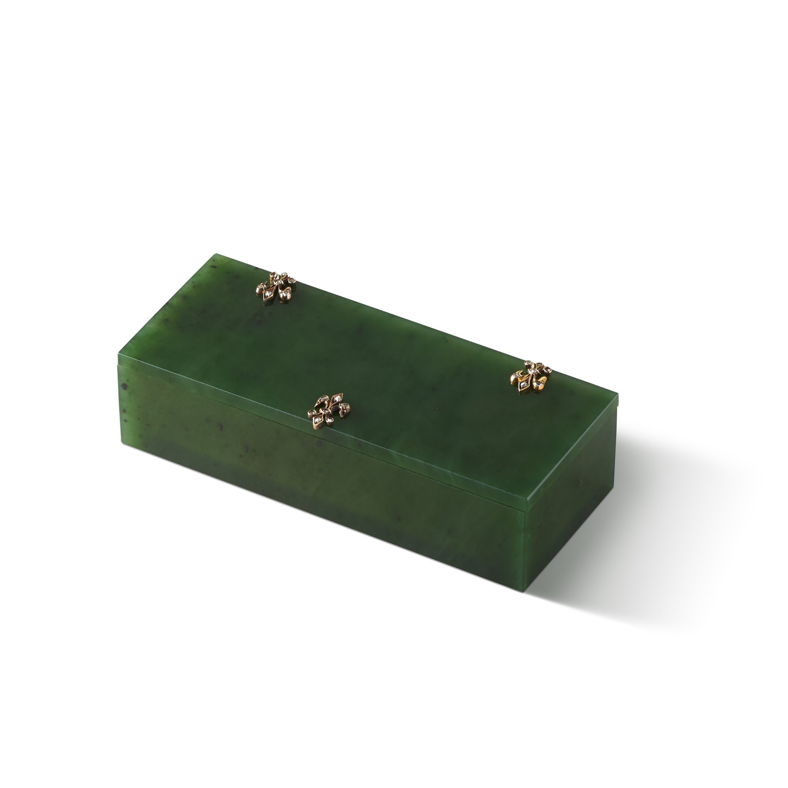 A carved nephrite and gem-set box by Carl Fabergé