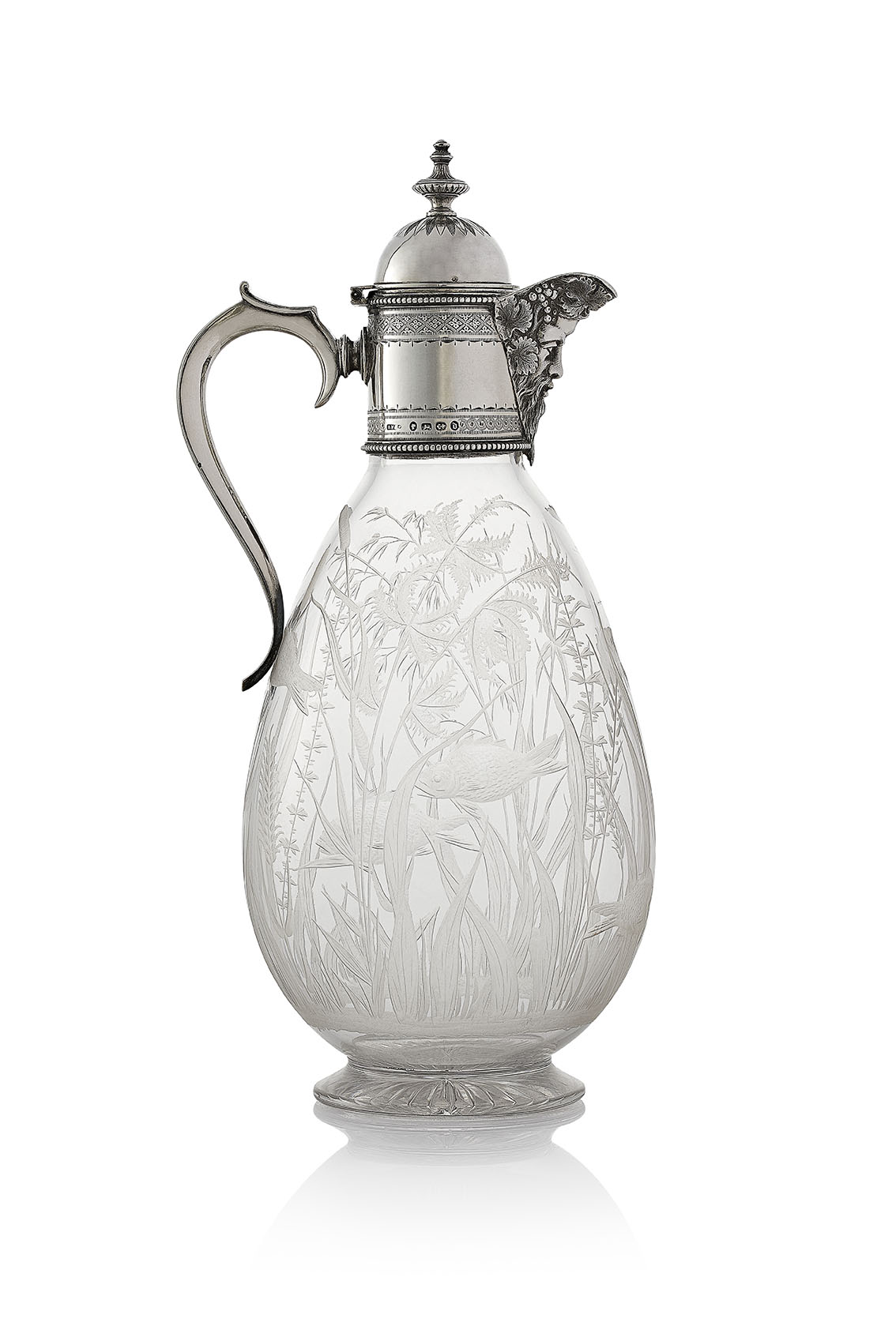 An antique silver mounted claret jug by Henry Wilkinson & Co