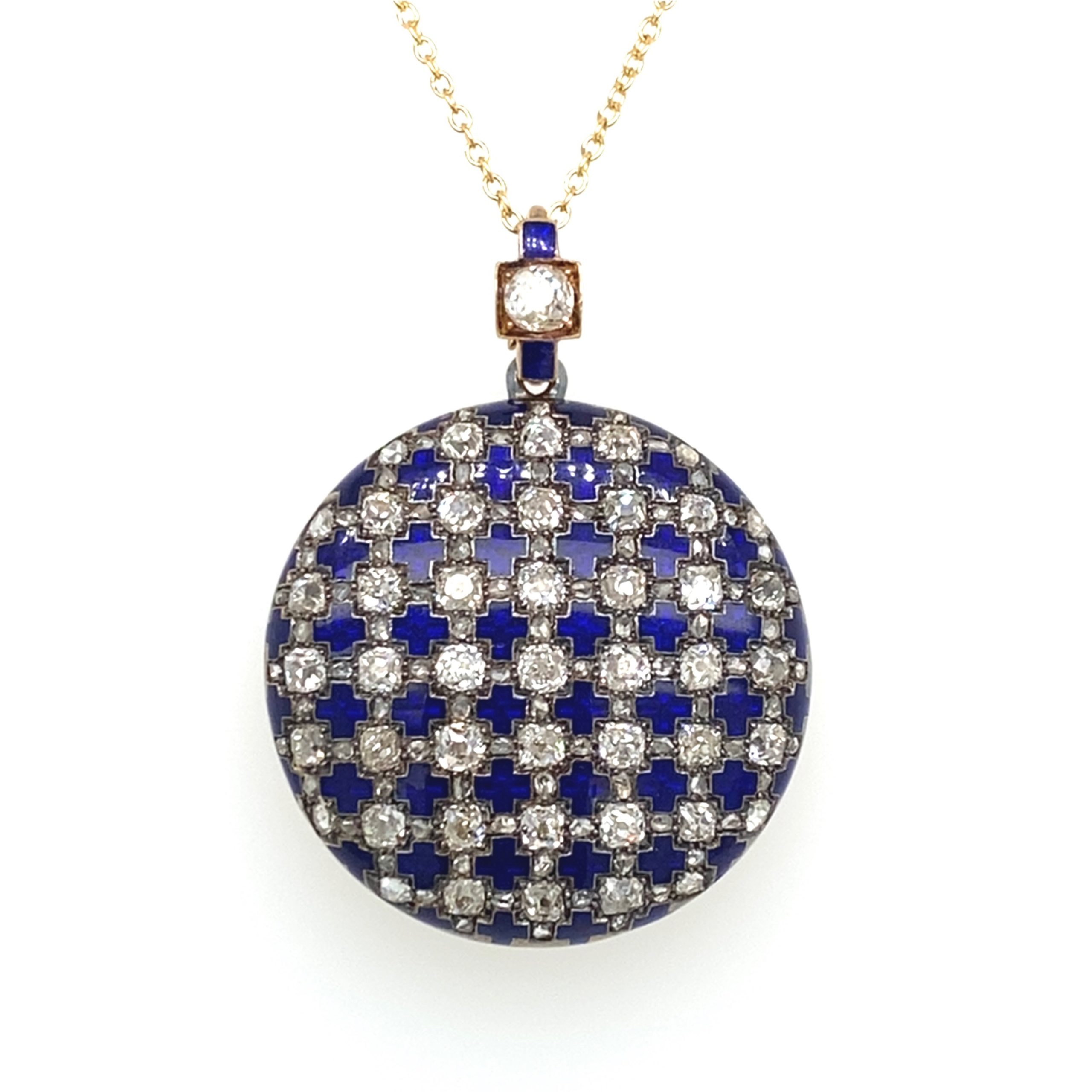 An antique enamelled gold and diamond set pendant