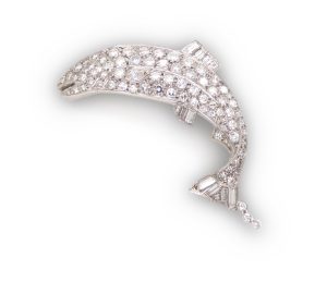 A leaping salmon brooch