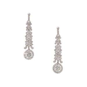 A pair of platinum and diamond drop earrings