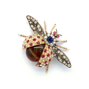 An antique gem-set ladybird brooch