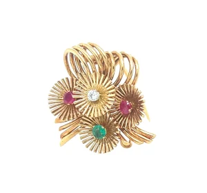 A jewelled gold brooch by Mellerio