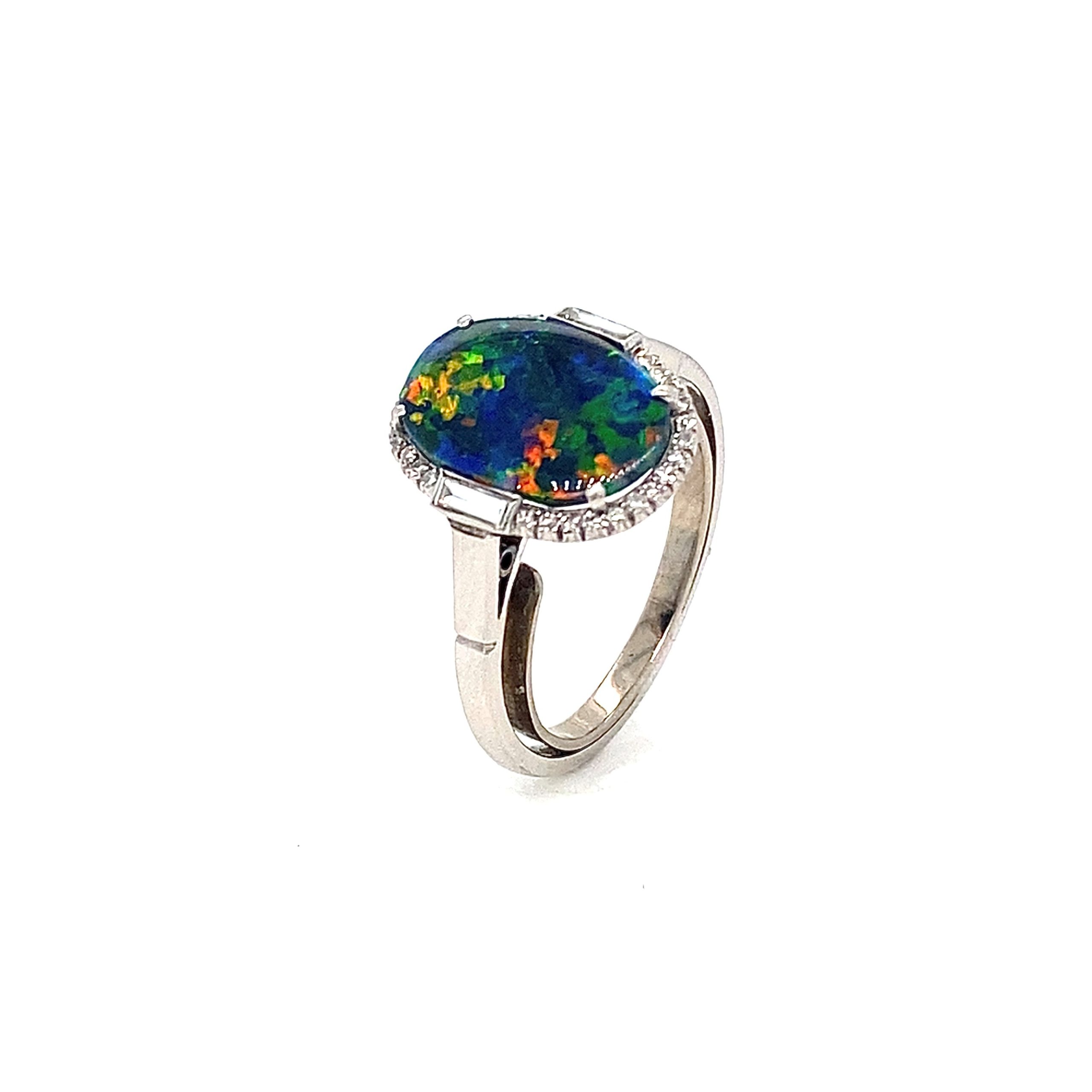 An Art Deco black opal and diamond ring