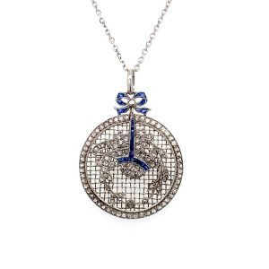An antique diamond and sapphire mounted pendant