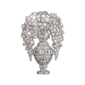 A platinum mounted diamond-set brooch by Lacloche Frères