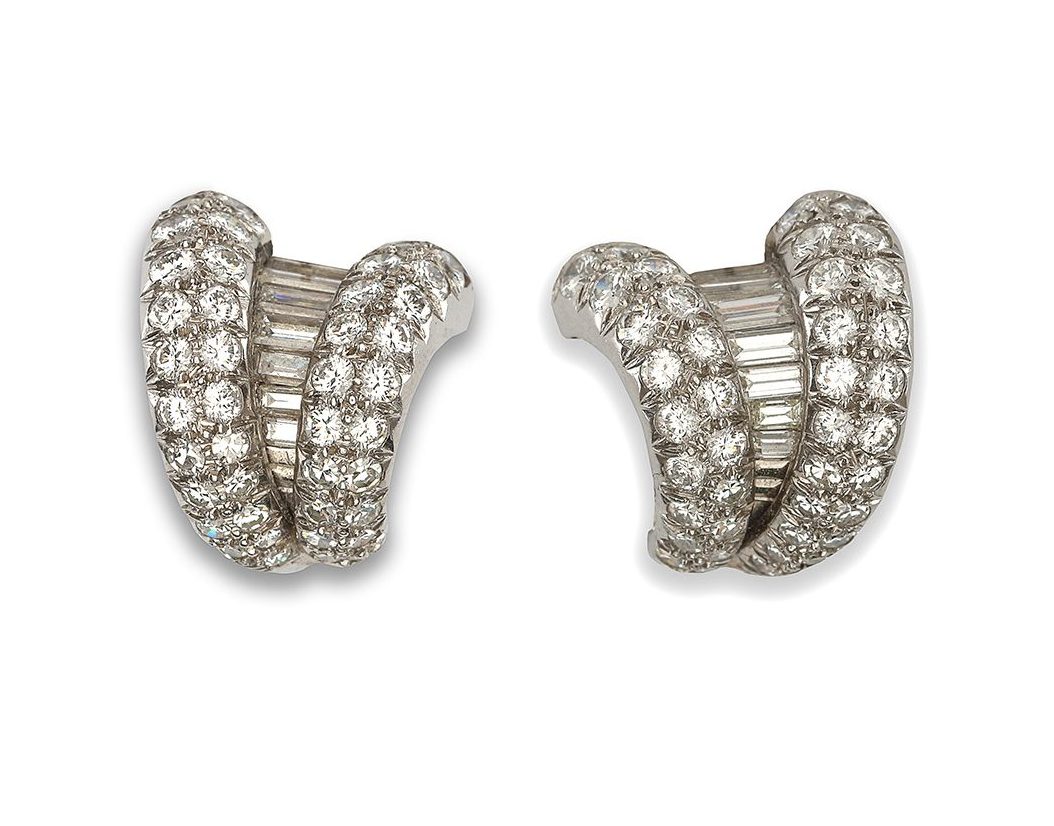 A pair of diamond ear clips