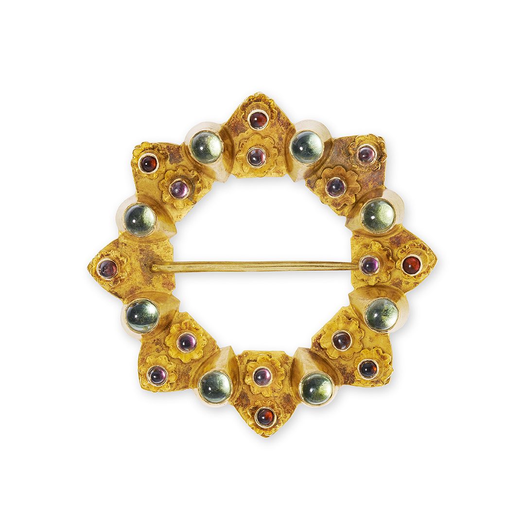 A gold brooch by Robert Naughten
