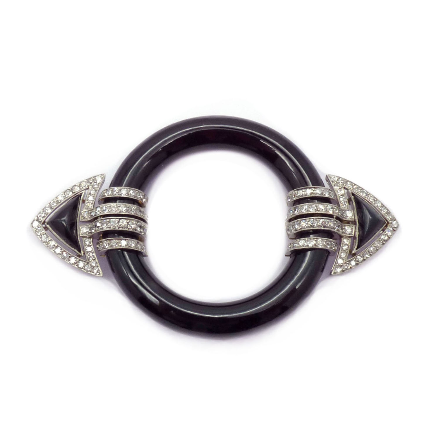 An Art Deco onyx and diamond brooch by Marzo