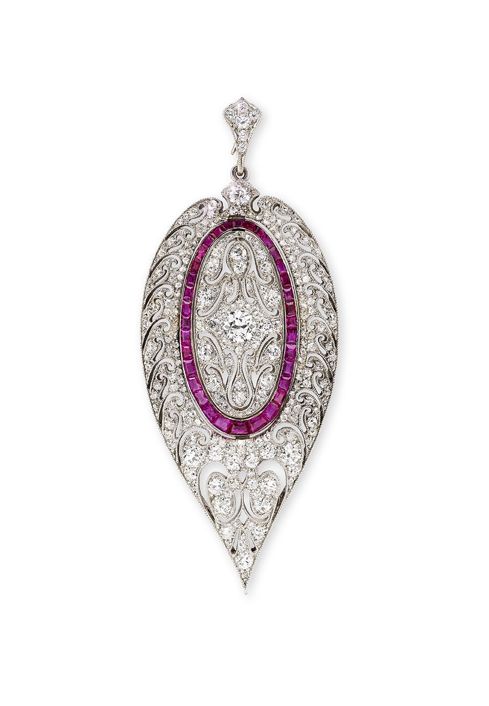 An openwork ruby and diamond pendant / brooch