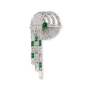 An Art Deco emerald and diamond brooch