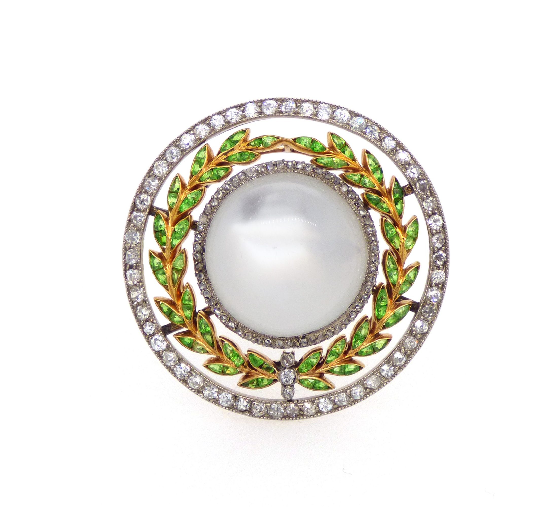 A jewelled platinum laurel wreath brooch