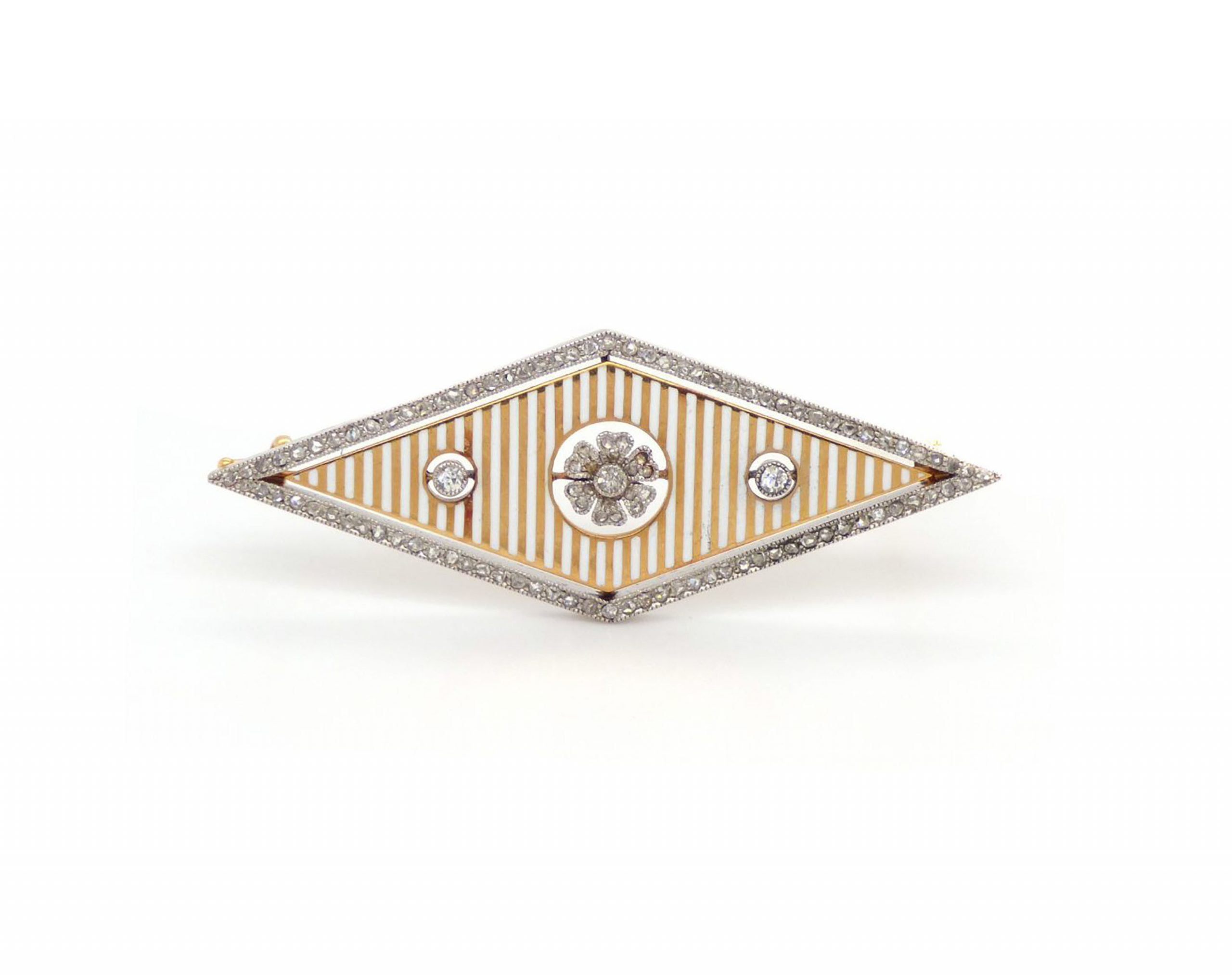 An enamelled gold & diamond set brooch by Carl Fabergé