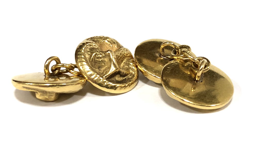 A pair of cufflinks by René Lalique