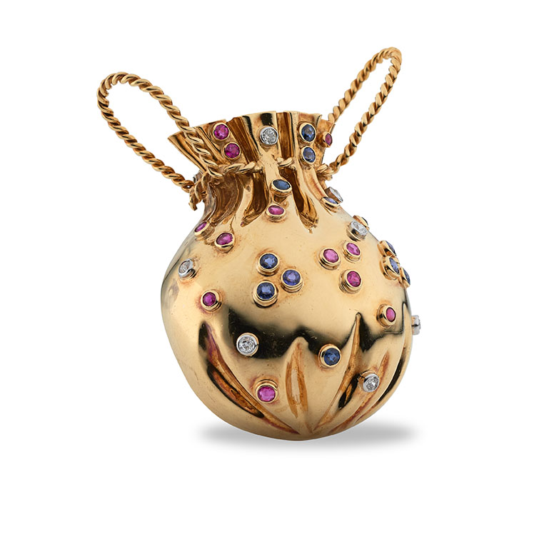 A gold and gem-set brooch by Paul Flato