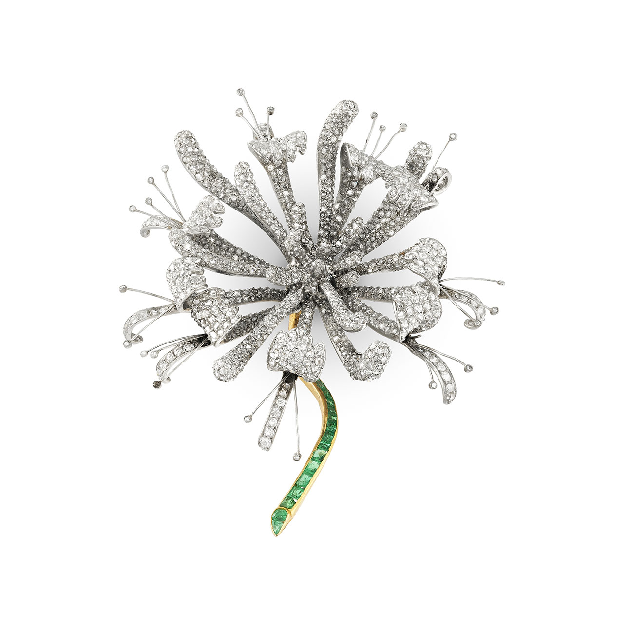 A platinum mounted diamond and emerald honeysuckle brooch