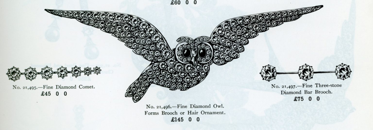 An antique diamond set owl brooch