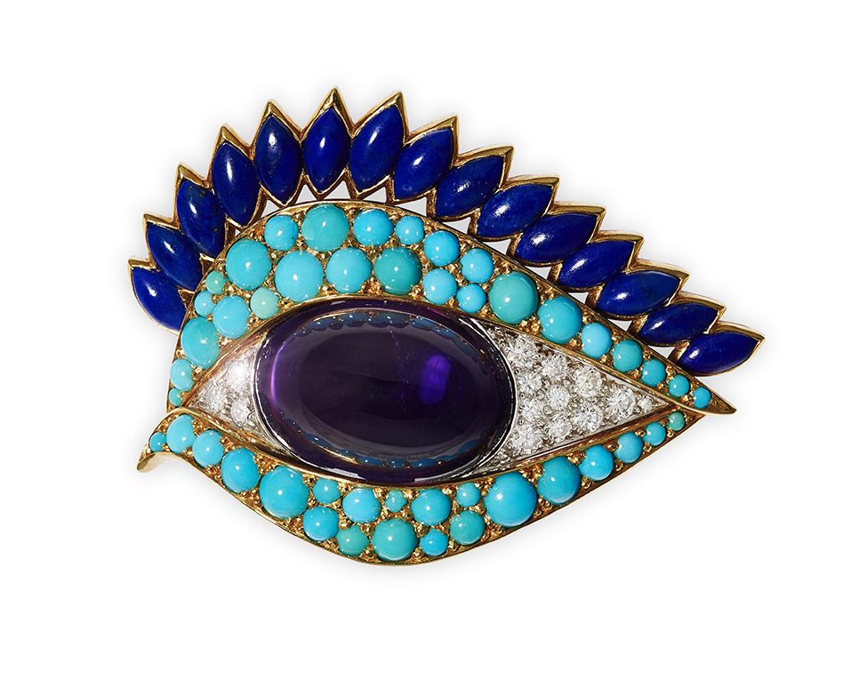 A gold mounted gem-set eye brooch by Cartier